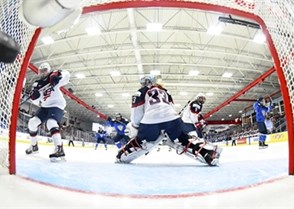 PLYMOUTH, MICHIGAN - APRIL 3: Finland's Susanna Tapani #12 scores a first period goal against USA's Alex Rigsby #33 while Gigi Marvin #19 and Megan Bozek #9 look on during preliminary round action at the 2017 IIHF Ice Hockey Women's World Championship. (Photo by Matt Zambonin/HHOF-IIHF Images)

