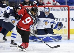 PLYMOUTH, MICHIGAN - APRIL 6: Canada's Jennifer Wakefield #9 with a scoring chance against Finland's Noora Raty #41 during semifinal round action at the 2017 IIHF Ice Hockey Women's World Championship. (Photo by Matt Zambonin/HHOF-IIHF Images)

